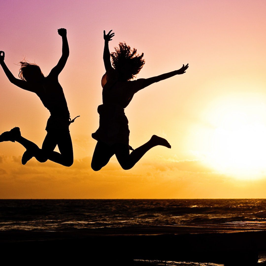 Silhouette Photography Of Jump Shot Of Two Persons Silhouette Photography Of Jump Shot Of Two Persons<br />